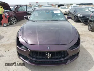 2019 Maserati Ghibli z VIN ZAM57YSL8K1312731, wystawiony jako IAAI lot #42240495 z przebiegiem 31 822 mil mil oraz . Historia ofert i sprzedaży dostępna na DreamBid. Obrazek 12.