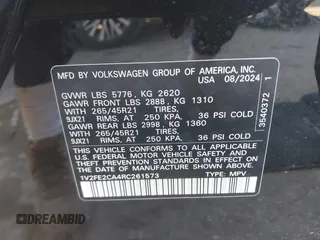 2024 Volkswagen Atlas SEL Premium R-Line z VIN 1V2FE2CA4RC261573, wystawiony jako IAAI lot #41156885 z przebiegiem 1 430 mil mil oraz . Historia ofert i sprzedaży dostępna na DreamBid. Obrazek 9.