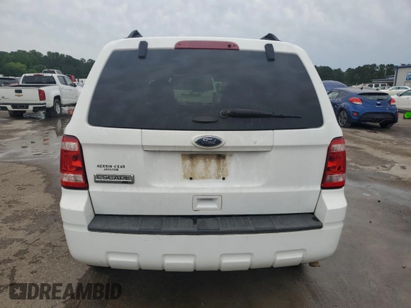 2012 Ford Escape XLT with VIN 1FMCU0D71CKA77294, listed as a Copart auction lot 55769595 with 256,238 mi miles and Salvage title. Bid and sale history available at DreamBid. Image 6.