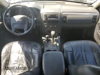 2004 Jeep Grand Cherokee Laredo with VIN 1J4GW48N34C425845, listed as a Copart auction lot 61200555 with 133,664 mi miles and Clean title. Bid and sale history available at DreamBid. Image 8.