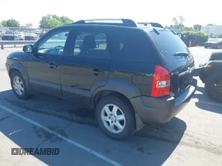 2005 Hyundai Tucson GLS with VIN KM8JN72D95U193338, listed as a IAAI auction lot 42205240 with 172,424 mi miles. Bid and sale history available at carsss.com. Image 3.