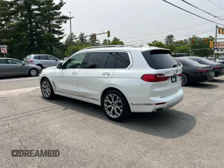 2019 BMW X7 xDrive50i z VIN 5UXCX4C55KLS38210, wystawiony jako Copart lot #59935315 z przebiegiem 126 853 mil mil oraz Czysty tytuł • Clean title. Historia ofert i sprzedaży dostępna na DreamBid. Obrazek 3.