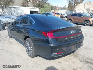 2023 Hyundai Sonata Limited with VIN KMHL34J28PA261498, listed as a IAAI auction lot 41598594 with 50,624 mi miles. Bid and sale history available at carsss.com. Image 3.