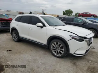 2016 Mazda CX-9 Grand Touring with VIN JM3TCBDY3G0117248, listed as a Copart auction lot 59703595 with 109,922 mi miles and Salvage title. Bid and sale history available at DreamBid. Image 4.