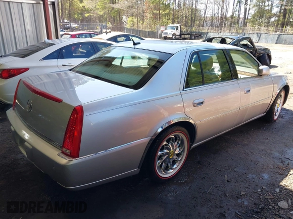 2006 Cadillac DTS w/1SC with VIN 1G6KD57Y46U165978, listed as a IAAI auction lot 41854728 with 116,455 mi miles. Bid and sale history available at carsss.com. Image 4.