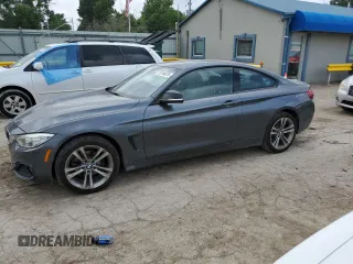 2014 BMW 4 Series 428i xDrive z VIN WBA3N5C51EF717379, wystawiony jako Copart lot #59744615 z przebiegiem 112 800 mil mil oraz Czysty tytuł • Clean title. Historia ofert i sprzedaży dostępna na DreamBid. Obrazek 1.