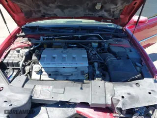 2002 Cadillac Eldorado ESC with VIN 1G6EL12Y72B102153, listed as a IAAI auction lot 41861541 with 91,273 mi miles. Bid and sale history available at carsss.com. Image 10.