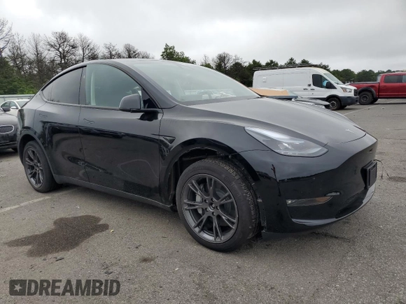 2024 Tesla Model Y Long Range with VIN 7SAYGDEE4RF198027, listed as a Copart auction lot 64008945 with 7,826 mi miles and Salvage title. Bid and sale history available at DreamBid. Image 4.