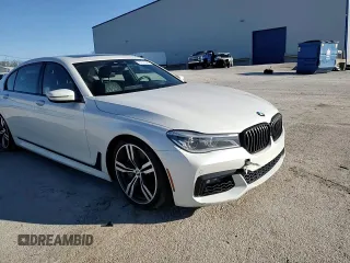 2017 BMW 7 Series 750i with VIN WBA7F0C39HGM22030, listed as a Copart auction lot 87127484 with 110,634 mi miles and Salvage title. Bid and sale history available at DreamBid. Image 13.