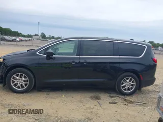 2017 Chrysler Pacifica Touring with VIN 2C4RC1DG8HR502333, listed as a IAAI auction lot 42357607 with 105,266 mi miles and . Bid and sale history available at DreamBid. Image 14.