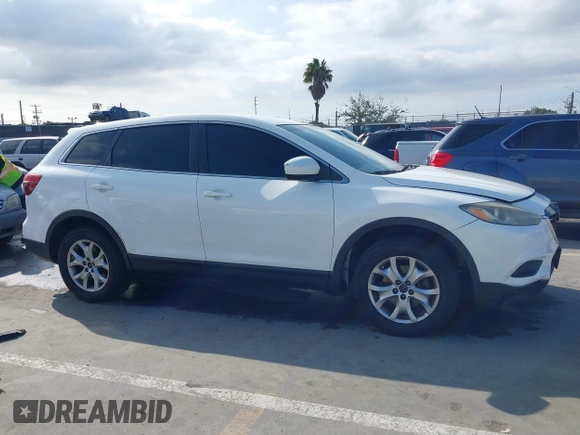 2015 Mazda CX-9 Sport with VIN JM3TB2BAXF0453244, listed as a IAAI auction lot 41905847 with 128,764 mi miles and . Bid and sale history available at carsss.com. Image 13.