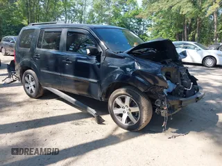 2013 Honda Pilot Touring with VIN 5FNYF3H96DB011470, listed as a IAAI auction lot 42535022 with 201,380 mi miles and . Bid and sale history available at DreamBid. Image 1.