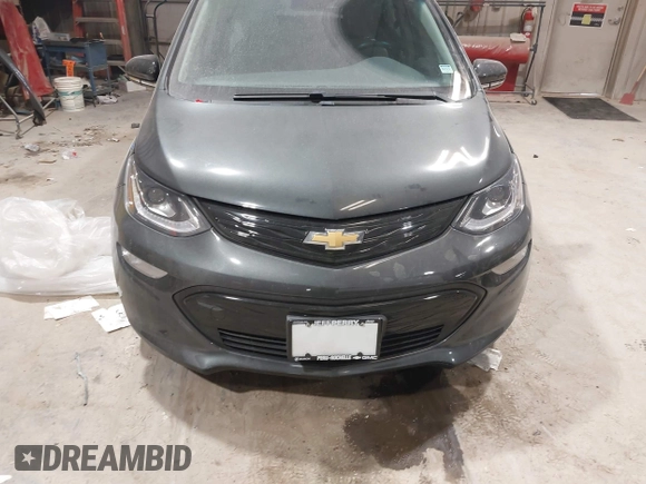 2021 Chevrolet Bolt EV LT z VIN 1G1FY6S05M4111315, wystawiony jako IAAI lot #41511422 z przebiegiem 14 433 mil mil oraz . Historia ofert i sprzedaży dostępna na DreamBid. Obrazek 11.