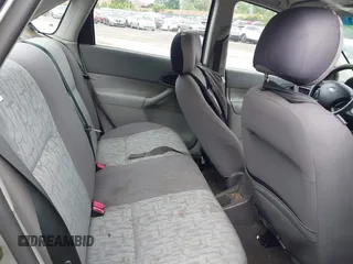 2005 Ford Focus S z VIN 1FAHP34N95W240955, wystawiony jako IAAI lot #42243013 z przebiegiem 251 204 mil mil oraz . Historia ofert i sprzedaży dostępna na DreamBid. Obrazek 8.