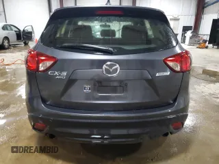 2014 Mazda CX-5 Sport with VIN JM3KE4BEXE0430076, listed as a Copart auction lot 58164695 with 183,130 mi miles and Salvage title. Bid and sale history available at DreamBid. Image 6.
