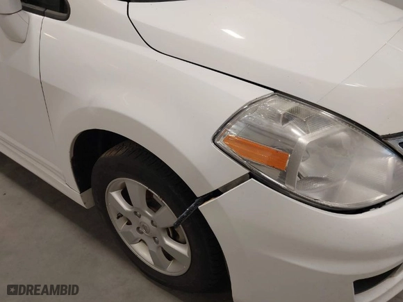 2011 Nissan Versa 1.8 S with VIN 3N1BC1CP0BL404861, listed as a IAAI auction lot 42035612 with 110,749 mi miles. Bid and sale history available at carsss.com. Image 6.