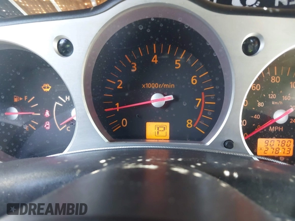 2004 Nissan 350Z Enthusiast z VIN JN1AZ34D74T164233, wystawiony jako IAAI lot #42509421 z przebiegiem 90 780 mil mil oraz . Historia ofert i sprzedaży dostępna na DreamBid. Obrazek 7.