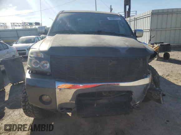 2006 Nissan Titan LE z VIN 1N6AA07B86N516155, wystawiony jako Copart lot #49080025 z przebiegiem 152 345 mil mil oraz Szkoda całkowita • Salvage title. Historia ofert i sprzedaży dostępna na DreamBid. Obrazek 5.