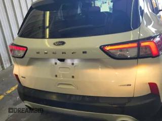 2020 Ford Escape SE with VIN 1FMCU9G60LUB25735, listed as a IAAI auction lot 42663606 with 91,591 mi miles and . Bid and sale history available at DreamBid. Image 4.