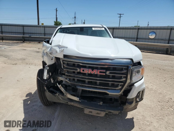 2022 GMC Canyon 4WD AT4 with VIN 1GTG6FEN2N1210072, listed as a Copart auction lot 53247005 with 64,897 mi miles and Salvage Title. Bid and sale history available at carsss.com. Image 5.