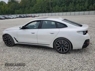 2024 BMW i4 eDrive40 z VIN WBY73AW07RFR74988, wystawiony jako Copart lot #70713824 z przebiegiem 14 117 mil mil oraz Szkody całkowita. Historia ofert i sprzedaży dostępna na DreamBid. Obrazek 2.