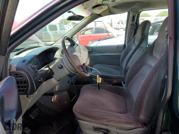 1999 Dodge Caravan with VIN 2B4FP25B0XR192013, listed as a Copart auction lot 55006624 with 195,008 mi miles and Salvage title. Bid and sale history available at DreamBid. Image 7.