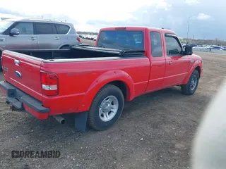 2009 Ford Ranger XLT with VIN 1FTYR44EX9PA66338, listed as a IAAI auction lot 42042655 with 103,447 mi miles. Bid and sale history available at carsss.com. Image 4.