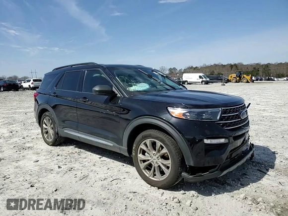 2021 Ford Explorer XLT with VIN 1FMSK7DH2MGC06991, listed as a Copart auction lot 48494615 with 61,222 mi miles and Salvage Title. Bid and sale history available at carsss.com. Image 12.