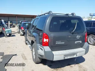 2012 Nissan Xterra X with VIN 5N1AN0NU8CC523668, listed as a IAAI auction lot 41821919 with 243,035 mi miles and . Bid and sale history available at DreamBid. Image 3.