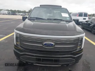 2023 Ford F-150 Lightning Pro with VIN 1FT6W1EV3PWG08587, listed as a IAAI auction lot 42418036 with Not provided miles and . Bid and sale history available at DreamBid. Image 11.