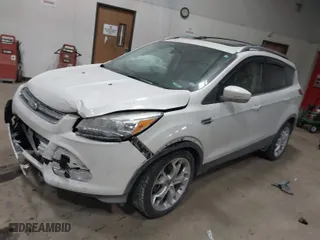 2016 Ford Escape Titanium with VIN 1FMCU9J9XGUC35958, listed as a IAAI auction lot 41389177 with 148,655 mi miles. Bid and sale history available at carsss.com. Image 2.