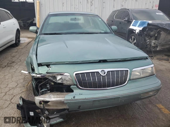 1997 Mercury Grand Marquis GS z VIN 2MELM74W7VX687221, wystawiony jako Copart lot #78665224 z przebiegiem 226 077 mil mil oraz Szkoda całkowita • Salvage title. Historia ofert i sprzedaży dostępna na DreamBid. Obrazek 5.