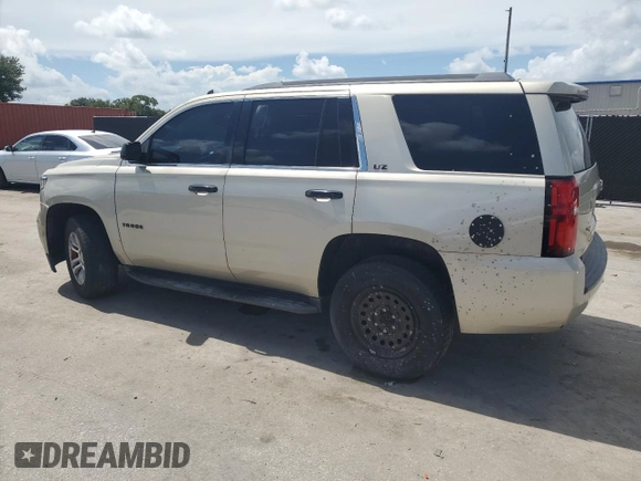 2015 Chevrolet Tahoe LS with VIN 1GNSCAKC2FR141953, listed as a Copart auction lot 65382145 with 271,798 mi miles and Clean title. Bid and sale history available at DreamBid. Image 2.