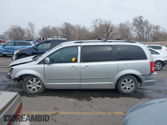 2010 Chrysler Town & Country Touring with VIN 2A4RR5D12AR208914, listed as a IAAI auction lot 41529269 with Not Provided miles and . Bid and sale history available at DreamBid. Image 13.