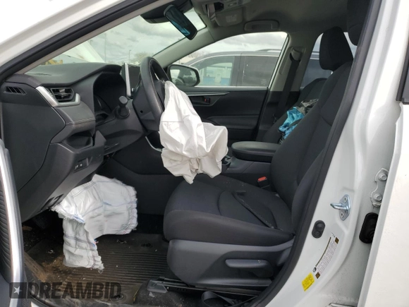 2023 Toyota RAV4 Hybrid LE with VIN JTMMWRFV3PD570648, listed as a Copart auction lot 86983174 with 27,258 mi miles and Salvage title. Bid and sale history available at DreamBid. Image 7.