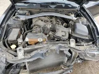2014 Ford Mustang V6 with VIN 1ZVBP8EM4E5215516, listed as a Copart auction lot 49997685 with 142,980 mi miles and Salvage Title. Bid and sale history available at carsss.com. Image 13.