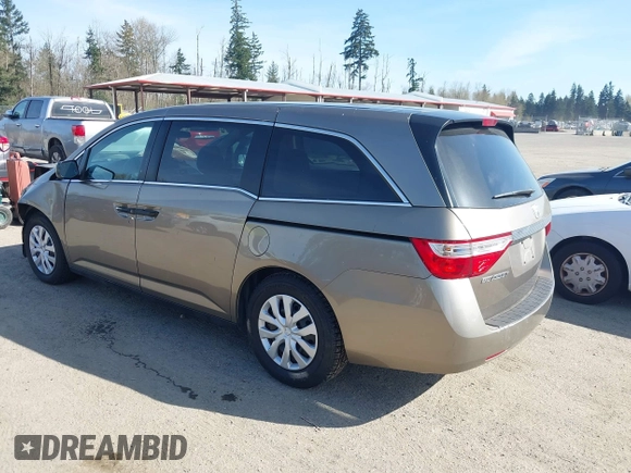 2013 Honda Odyssey LX z VIN 5FNRL5H29DB055166, wystawiony jako IAAI lot #41965037 z przebiegiem 122 470 mil mil oraz . Historia ofert i sprzedaży dostępna na DreamBid. Obrazek 3.