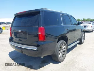 2015 Chevrolet Tahoe LTZ with VIN 1GNSCCKC4FR309152, listed as a IAAI auction lot 42029341 with 187,313 mi miles and . Bid and sale history available at DreamBid. Image 4.