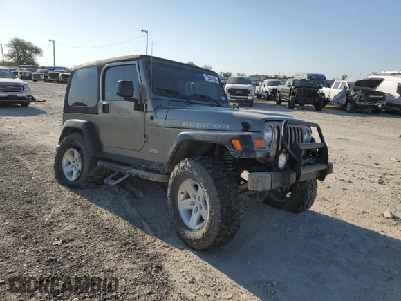 2003 Jeep Wrangler Rubicon with VIN 1J4FA69S73P339925, listed as a Copart auction lot 75341094 with Not provided miles and Salvage title. Bid and sale history available at DreamBid. Image 4.