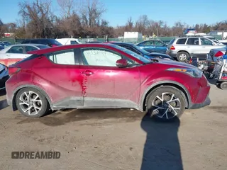 2018 Toyota C-HR XLE with VIN NMTKHMBX6JR055262, listed as a IAAI auction lot 41338914 with 72,501 mi miles and . Bid and sale history available at DreamBid. Image 14.