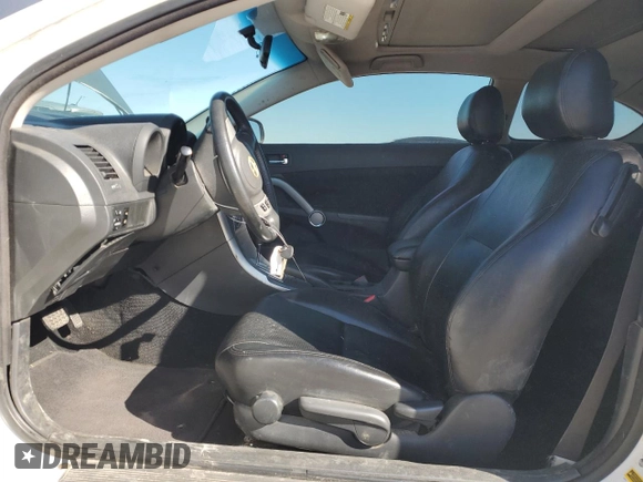 2009 Scion tC with VIN JTKDE167990297899, listed as a Copart auction lot 48591365 with 122,056 mi miles and Salvage Title. Bid and sale history available at carsss.com. Image 7.