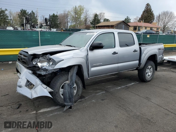 2015 Toyota Tacoma with VIN 3TMLU4EN4FM168078, listed as a Copart auction lot 54689785 with 103,716 mi miles and Salvage Title. Bid and sale history available at DreamBid. Image 1.