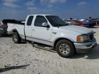 1999 Ford F-250 с VIN 1FTRX27L8XKA26097, выставлен на аукционе Copart как лот 43270015 с пробегом 201 792 миль миль и Списание • Salvage title. История ставок и продаж доступна на DreamBid. Изображение 4.