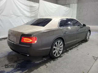 2014 Bentley Flying Spur z VIN SCBEC9ZA9EC092313, wystawiony jako Copart lot #47265115 z przebiegiem 25 479 mil mil oraz Tytuł czysty. Historia ofert i sprzedaży dostępna na DreamBid. Obrazek 3.