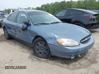 2001 Ford Taurus z VIN 1FAFP52211A244260, wystawiony jako IAAI lot #42099611 z przebiegiem 148 874 mil mil oraz . Historia ofert i sprzedaży dostępna na DreamBid. Obrazek 1.