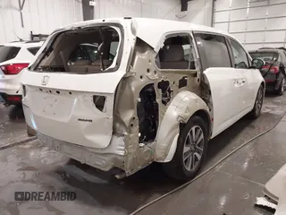 2015 Honda Odyssey Touring Elite with VIN 5FNRL5H92FB020159, listed as a IAAI auction lot 42103240 with 79,322 mi miles and . Bid and sale history available at DreamBid. Image 6.