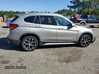 2021 BMW X1 sDrive28i with VIN WBXJG7C0XM5S33884, listed as a Copart auction lot 48413405 with 89,698 mi miles and Salvage Title. Bid and sale history available at DreamBid. Image 3.