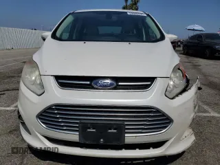 2015 Ford C-Max SEL z VIN 1FADP5CU1FL103305, wystawiony jako Copart lot #59980695 z przebiegiem 118 972 mil mil oraz Szkoda całkowita • Salvage title. Historia ofert i sprzedaży dostępna na DreamBid. Obrazek 5.