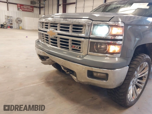 2015 Chevrolet Silverado 1500 LTZ with VIN 3GCUKSEC1FG473825, listed as a IAAI auction lot 41710553 with 212,959 mi miles and . Bid and sale history available at DreamBid. Image 19.