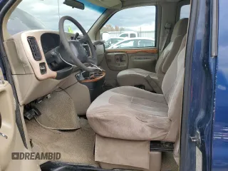 2001 Chevrolet Chevy Van z VIN 1GBFG15M411225075, wystawiony jako Copart lot #56948945 z przebiegiem 201 558 mil mil oraz Tytuł czysty. Historia ofert i sprzedaży dostępna na DreamBid. Obrazek 7.